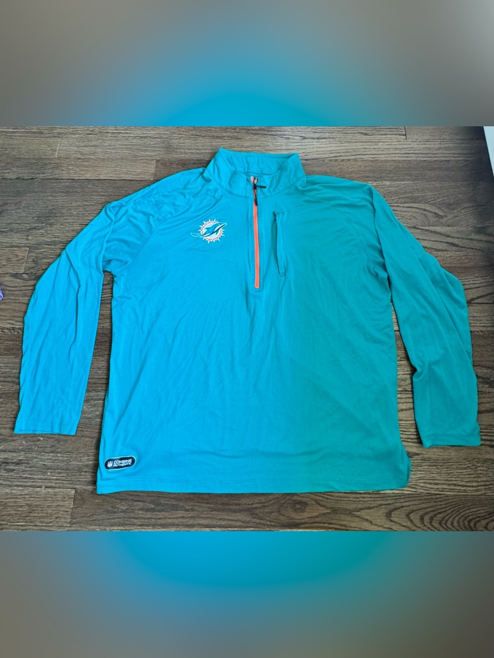 NFL Teal Pullover with Orange Zipper Trim
